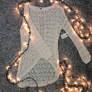 Cream colored sheer long sleeve